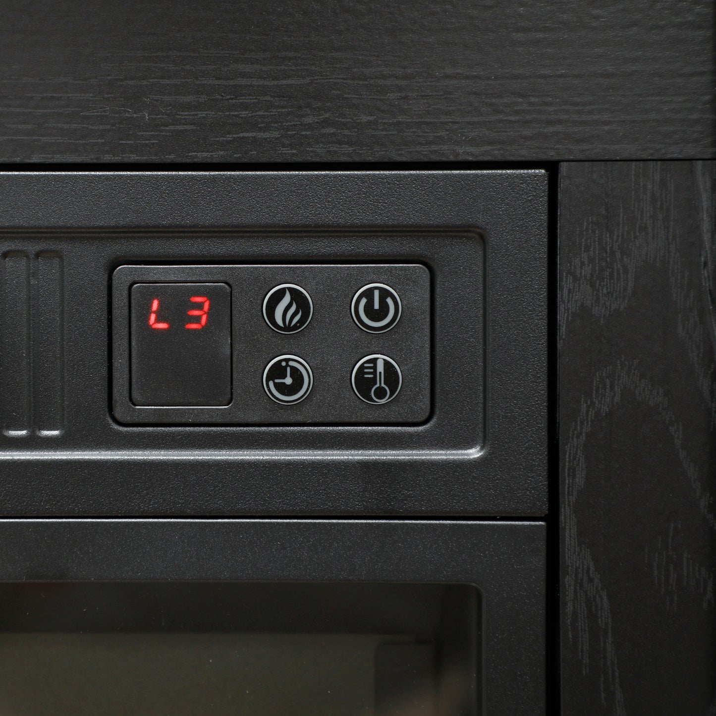 Black electric fireplace control panel with digital display showing L