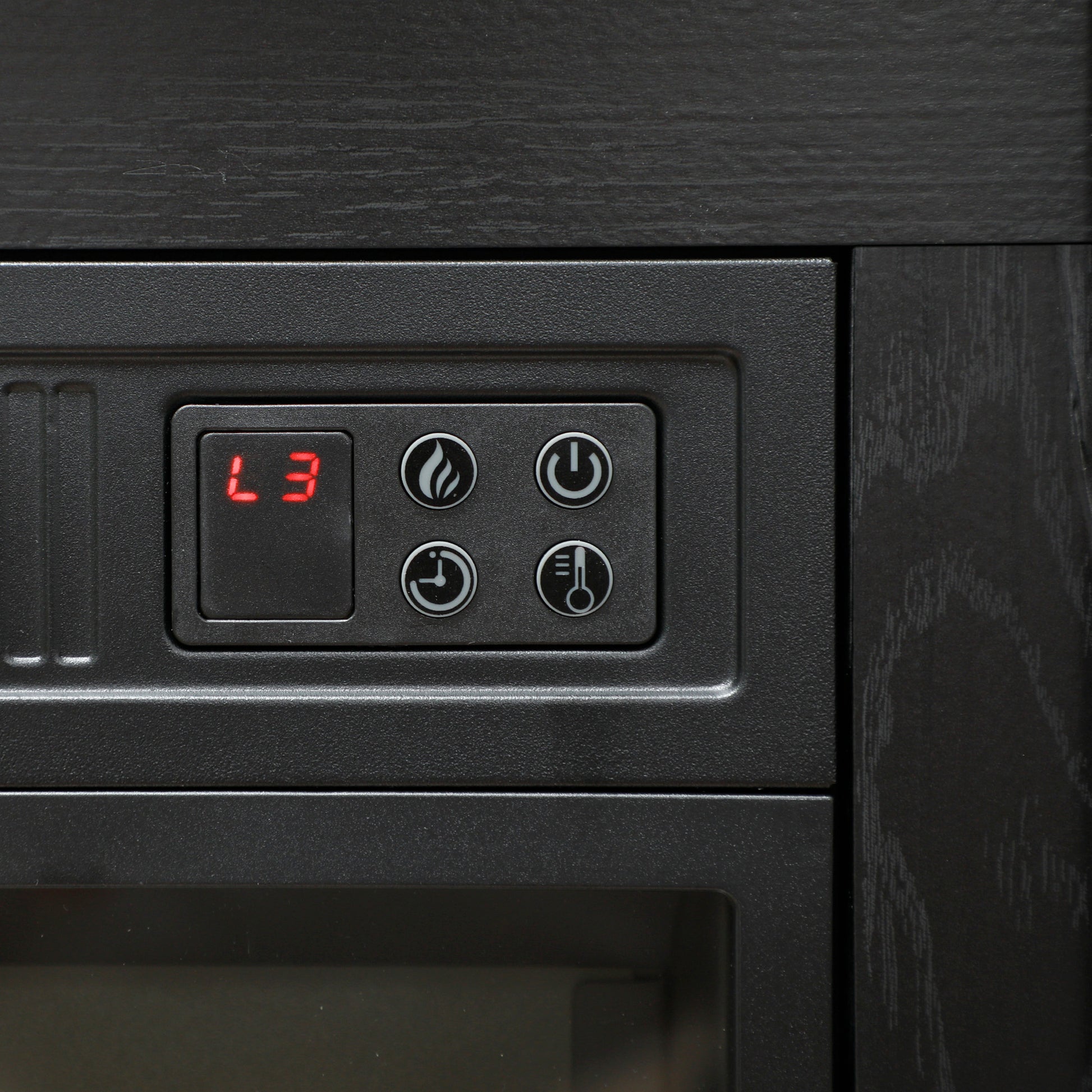 Black electric fireplace control panel with digital display showing L
