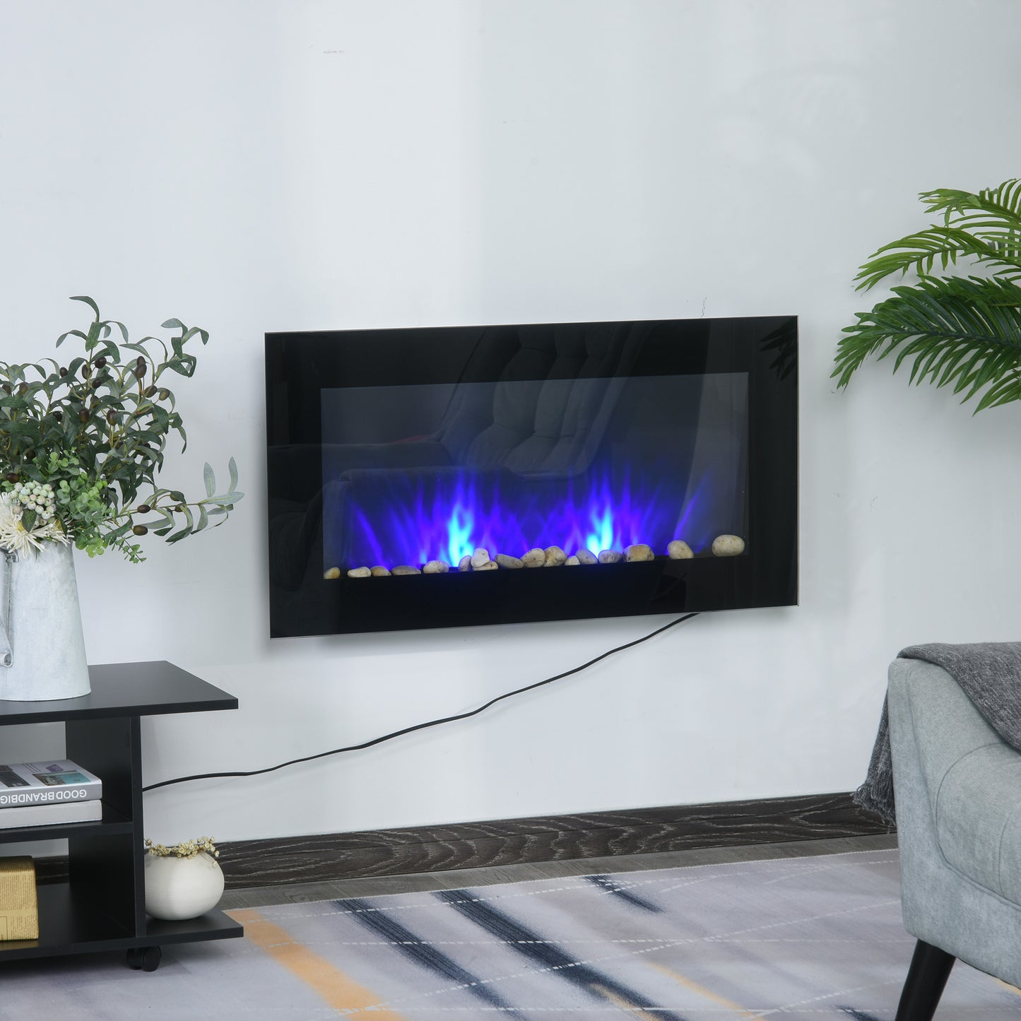 Black electric fireplace with blue flame effect