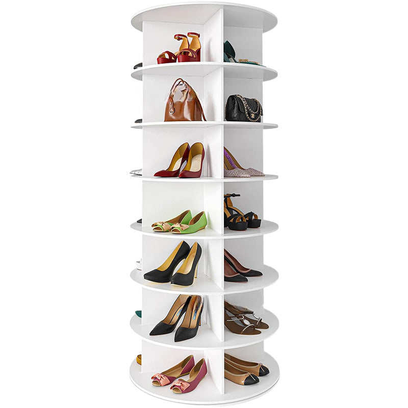 White rotating shoe rack filled with various heels and handbags
