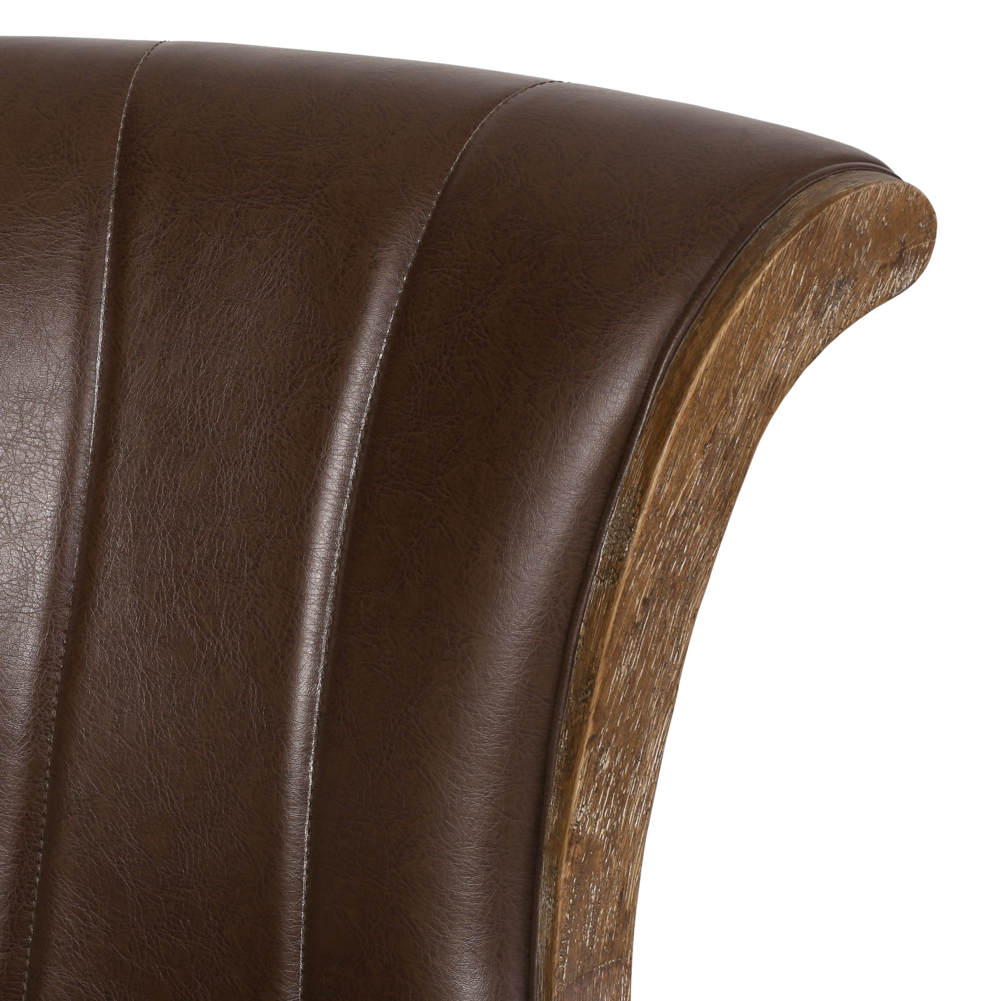Rich brown leather upholstered chair back with carved wood accent