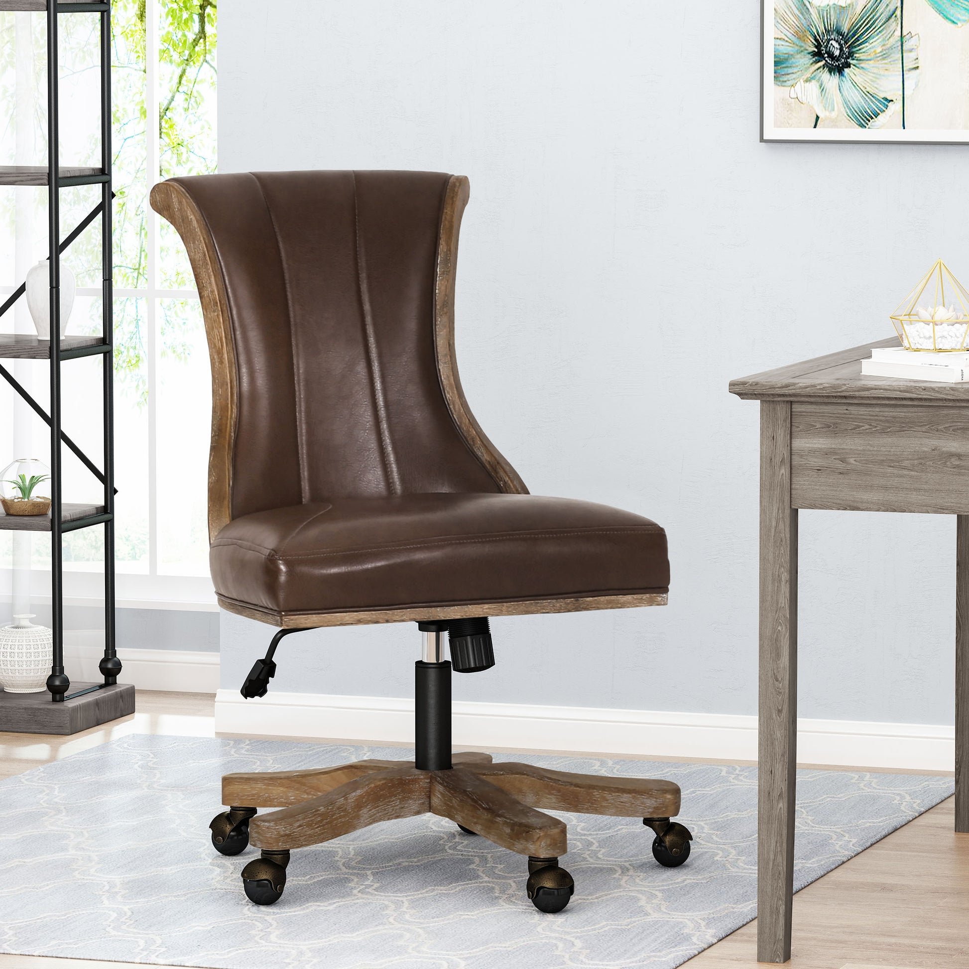 Brown leather office chair with wooden accents and wheeled base