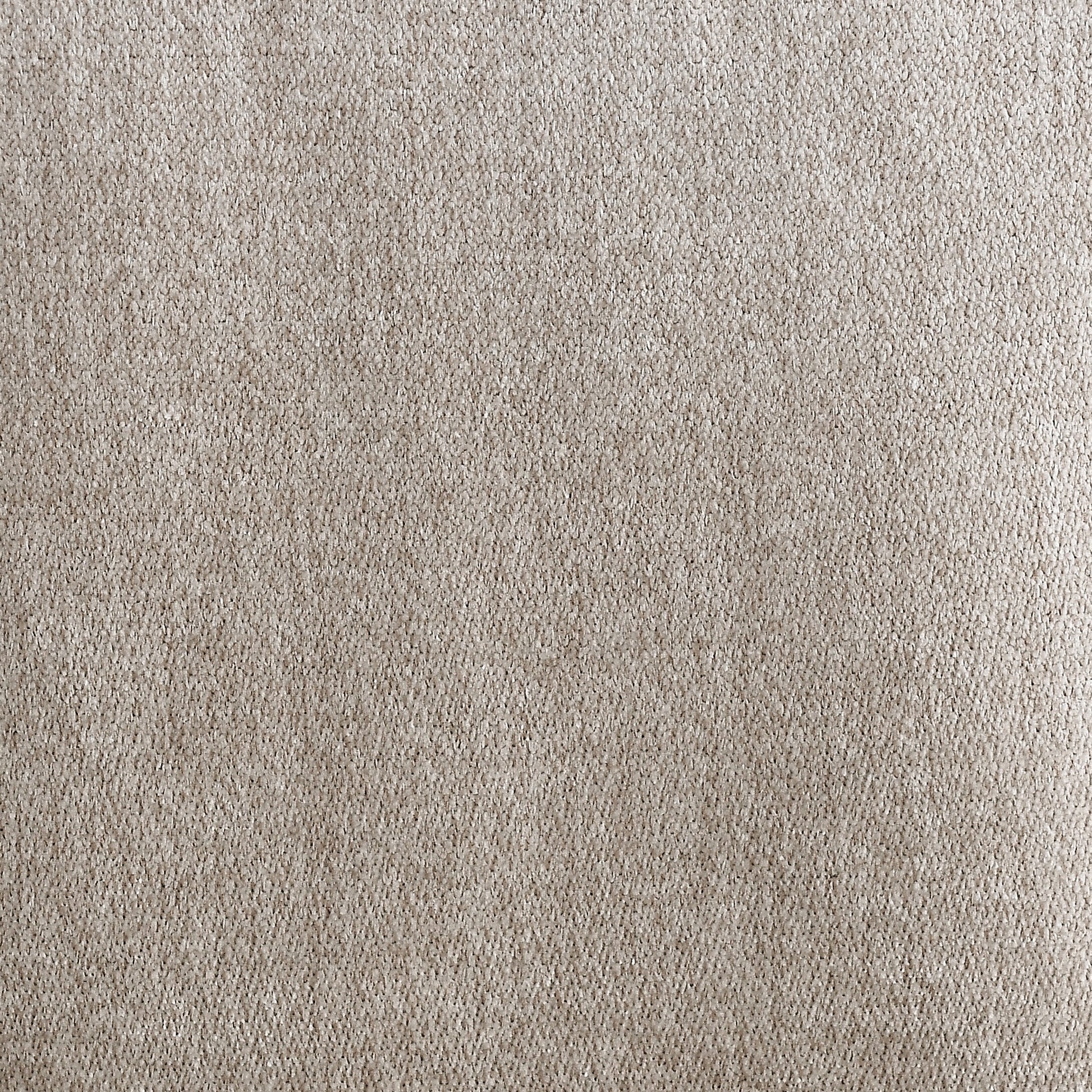 Closeup textured weave of a light beige upholstery fabric