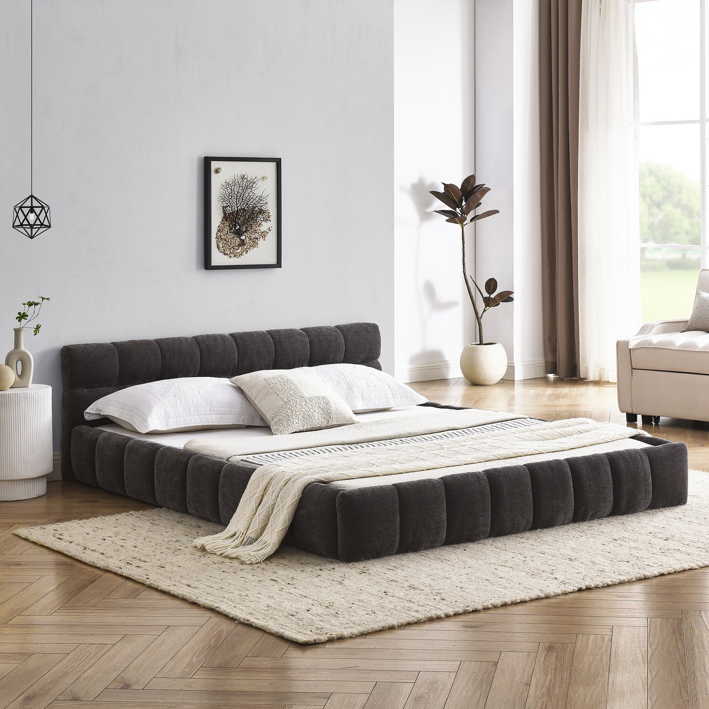 Dark gray upholstered king size bed with tufted headboard and footboard