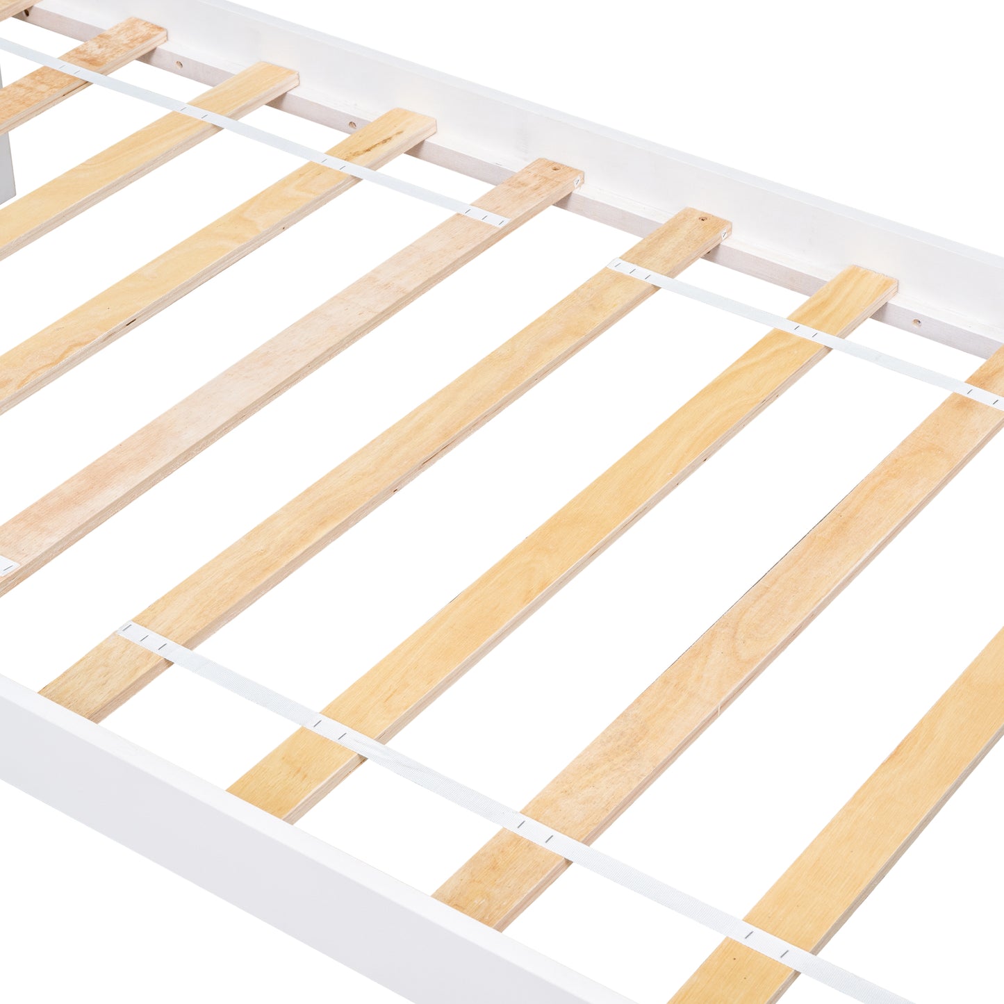 Close up of white bed frame with wooden slats