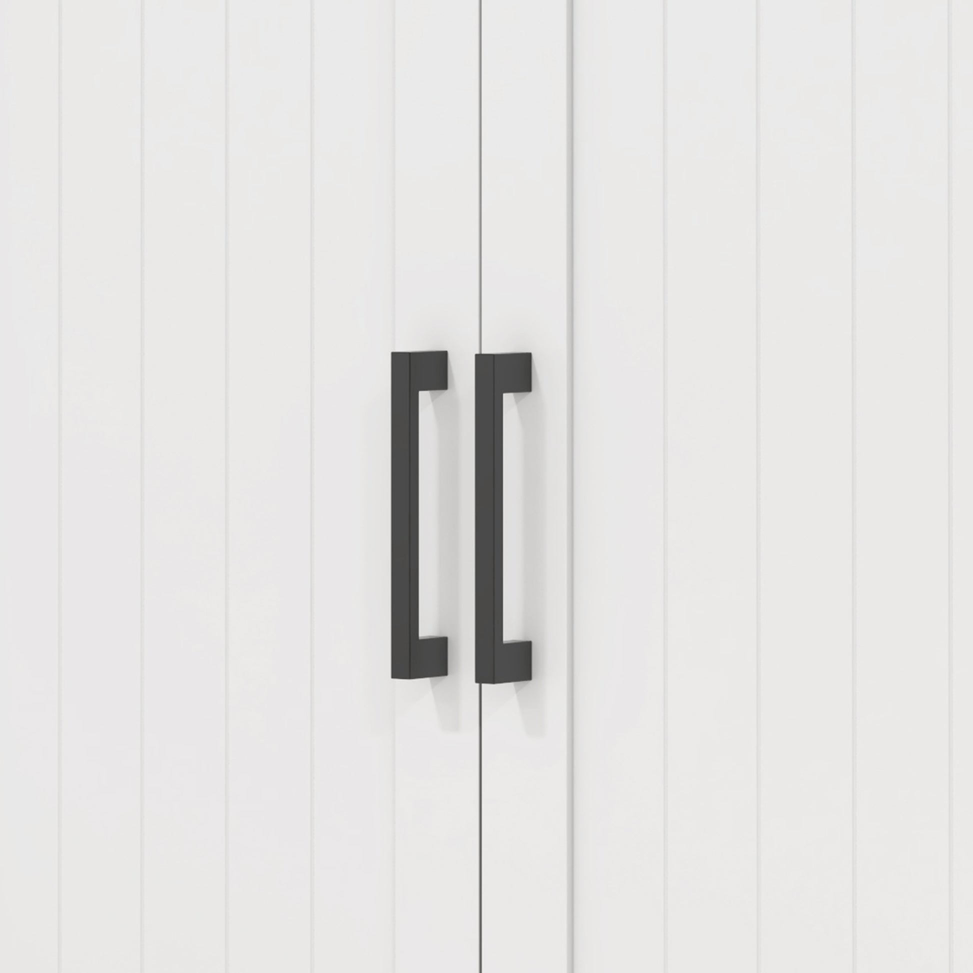 White cabinet doors with modern black bar handles
