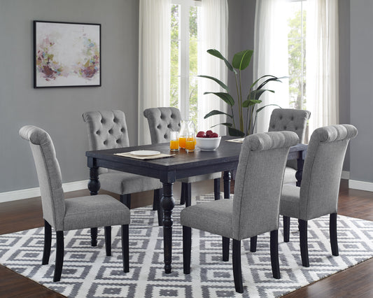Elegant upholstered grey dining chairs with tufted backs around a dark wood table