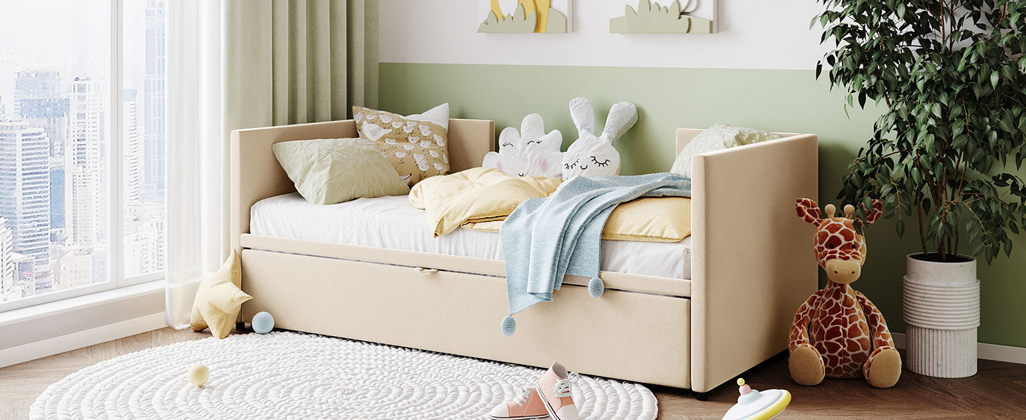 Beige upholstered daybed with pullout trundle perfect for kids rooms