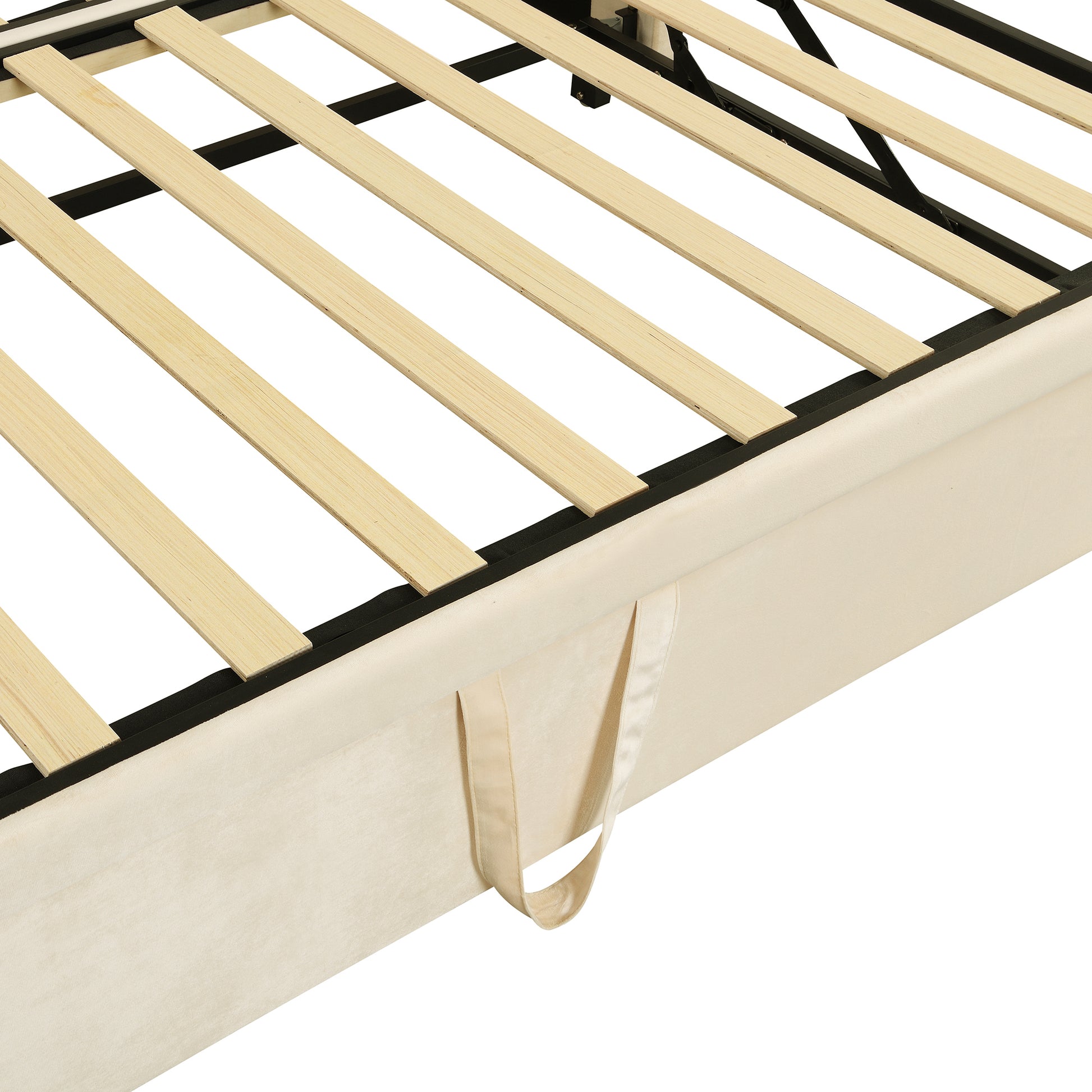 Closeup of a beige upholstered bed frame with sturdy wooden slats