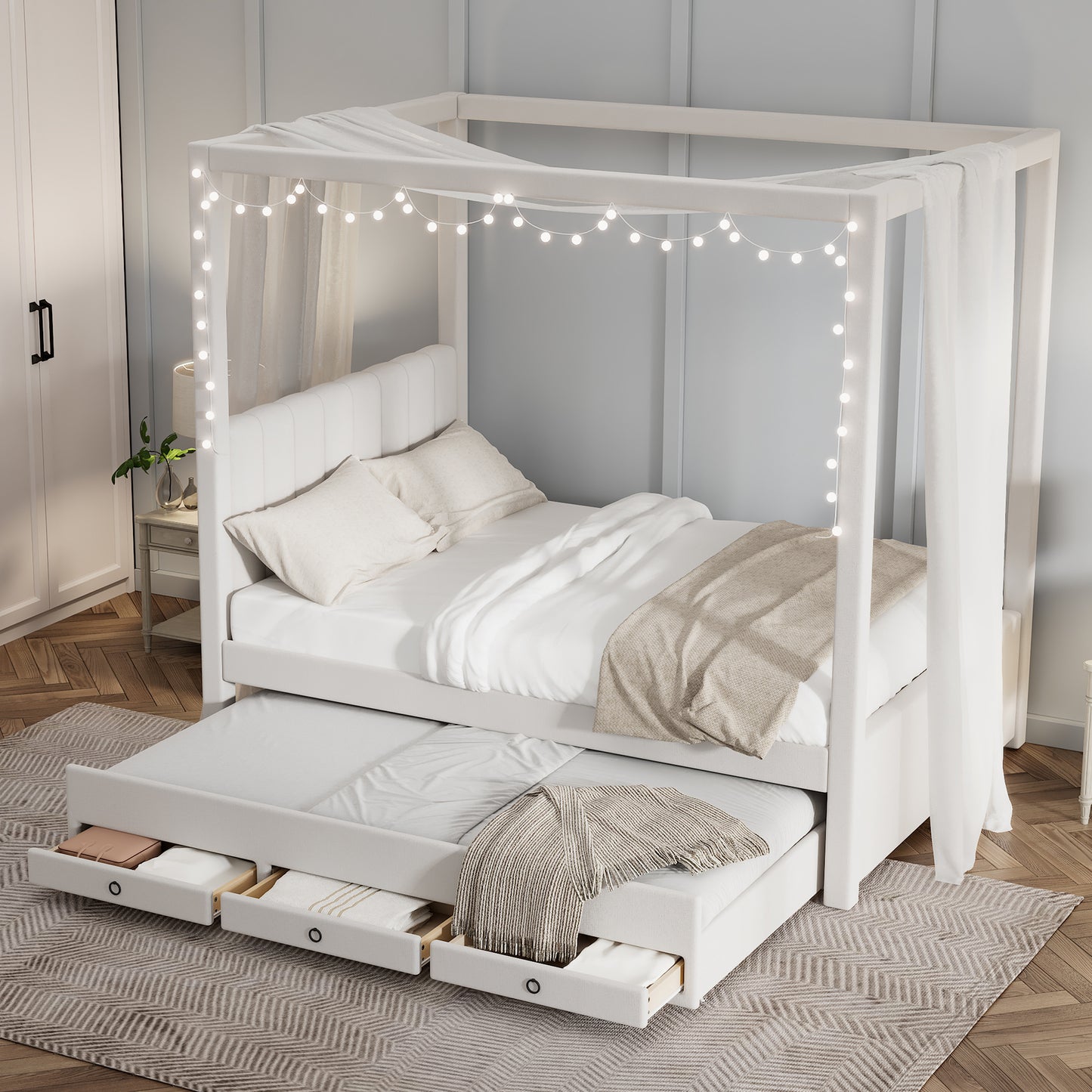 White upholstered canopy bed with trundle and storage drawers