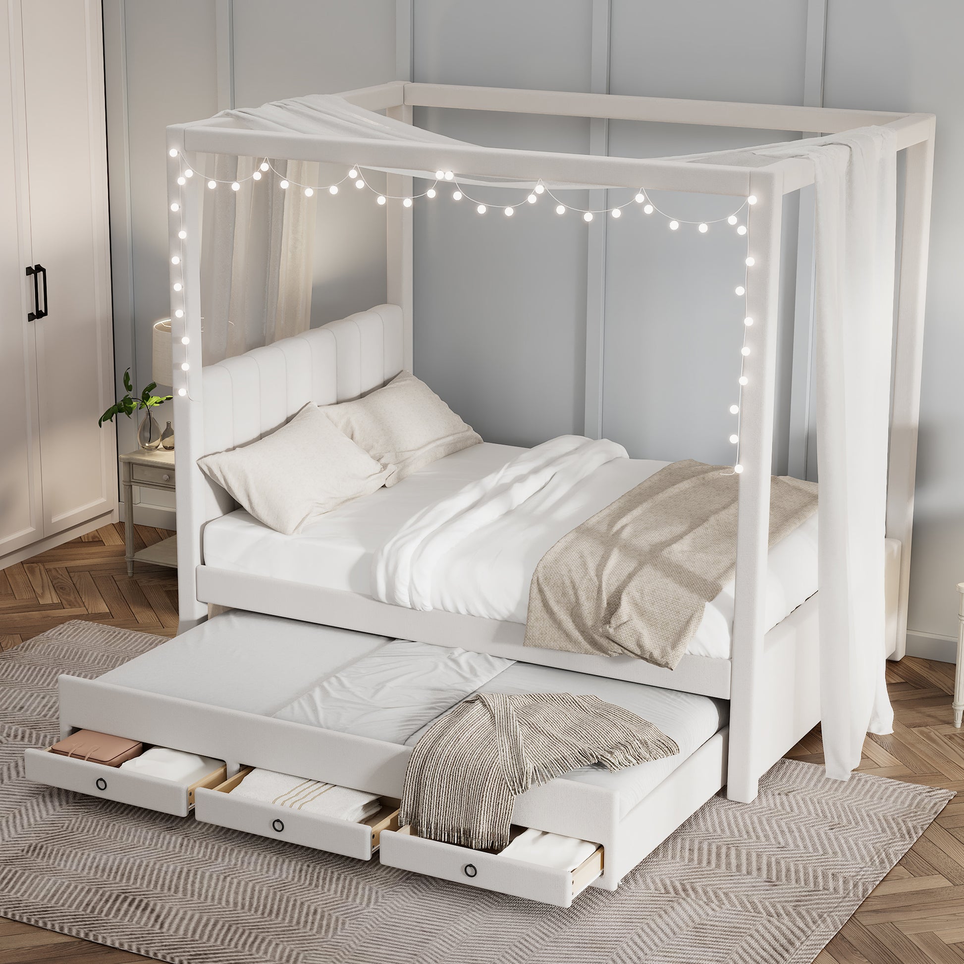 White upholstered canopy bed with trundle and storage drawers