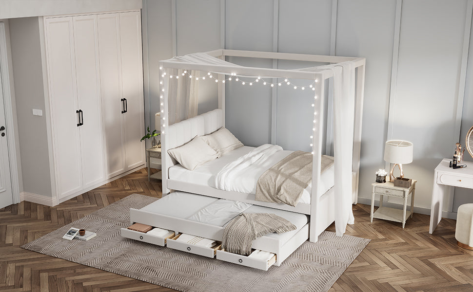 White canopy bed with pullout trundle and storage drawers