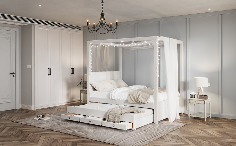 White fourposter bed with pullout trundle and storage drawers