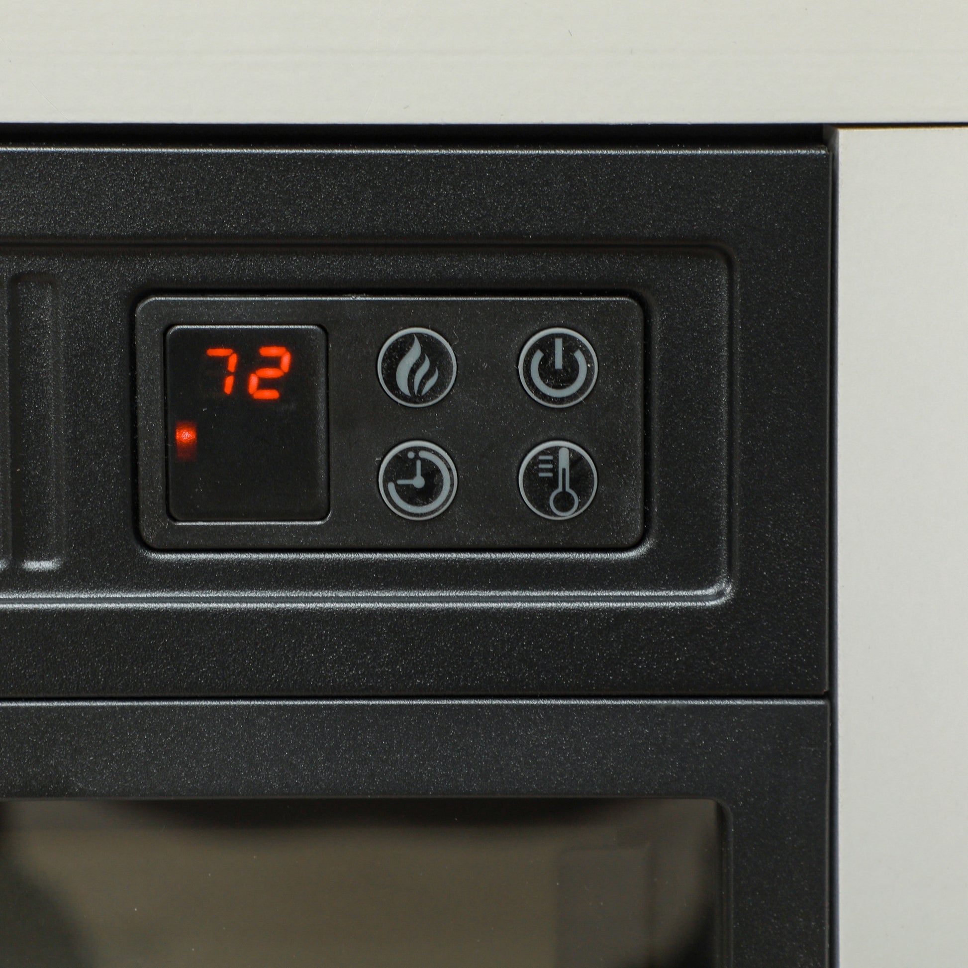 Digital fireplace control panel showing  degrees Fahrenheit