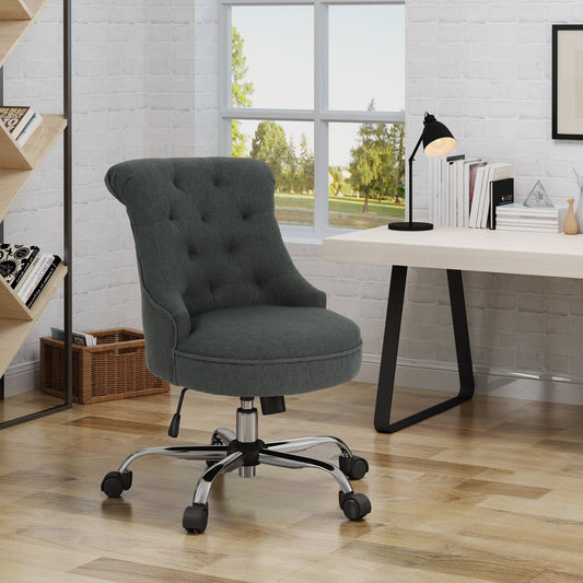 Dark grey tufted office chair with chrome base and wheels