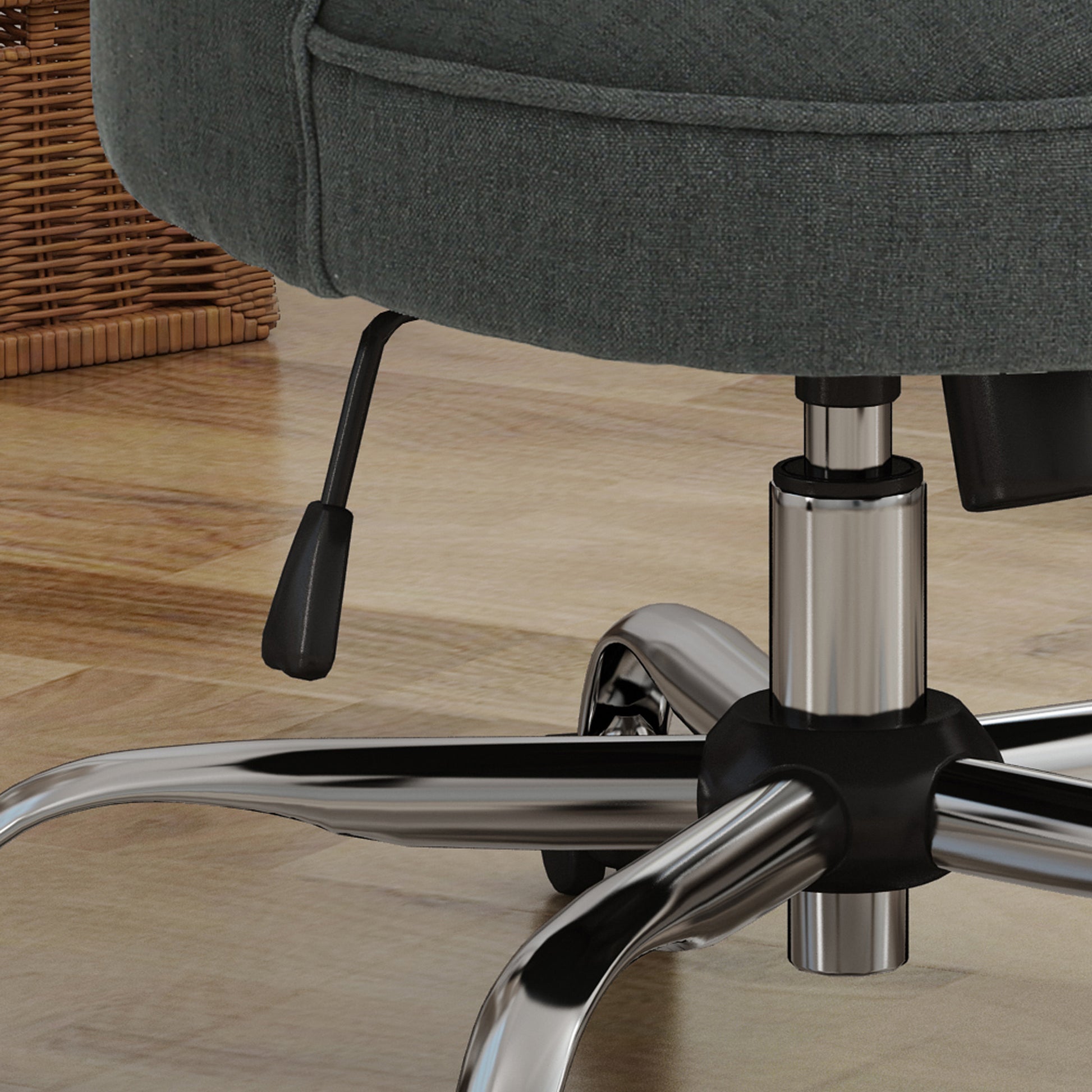 Dark gray fabric office chair detail with chrome base and lever