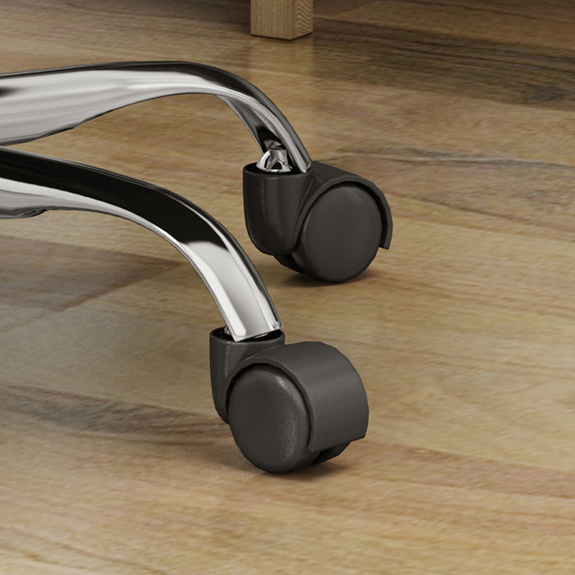 Closeup of office chair casters on wood floor