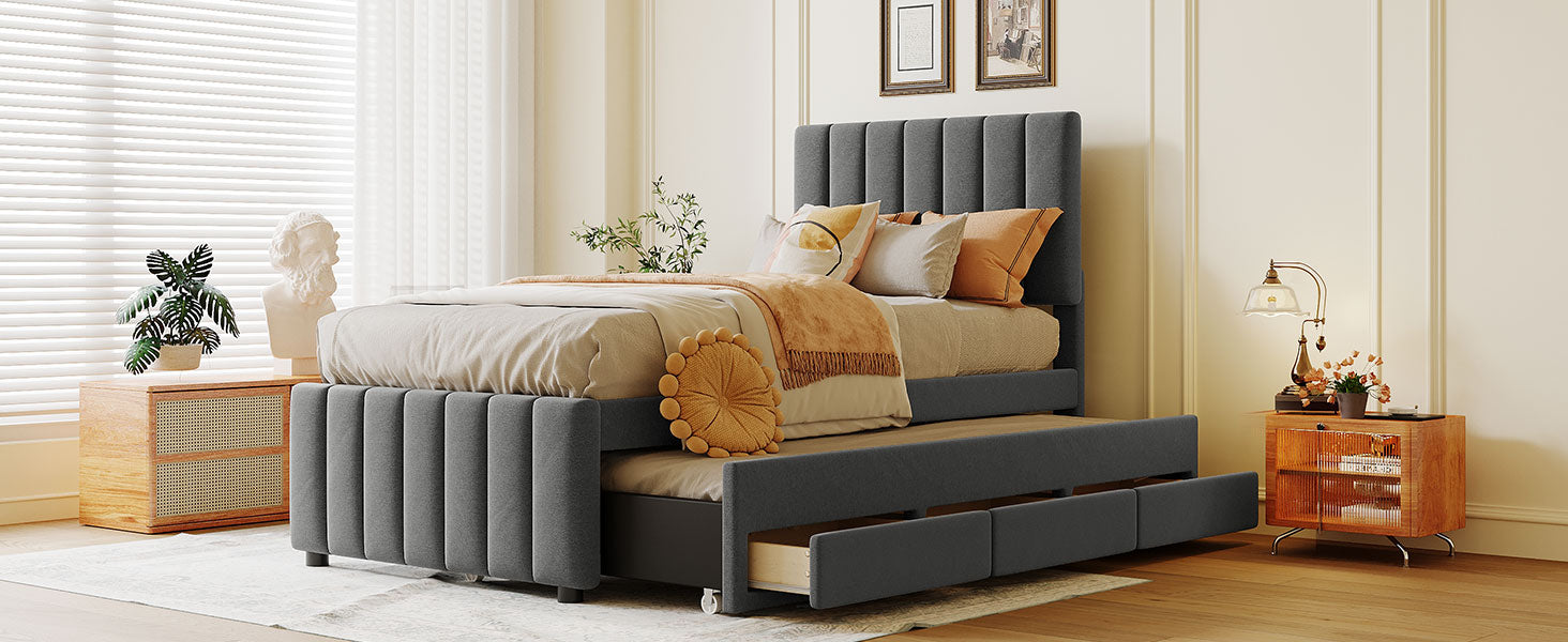 Grey upholstered daybed with trundle and three storage drawers