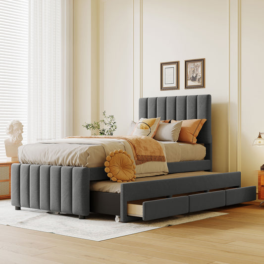 Dark gray upholstered platform bed with tufted headboard and pullout trundle