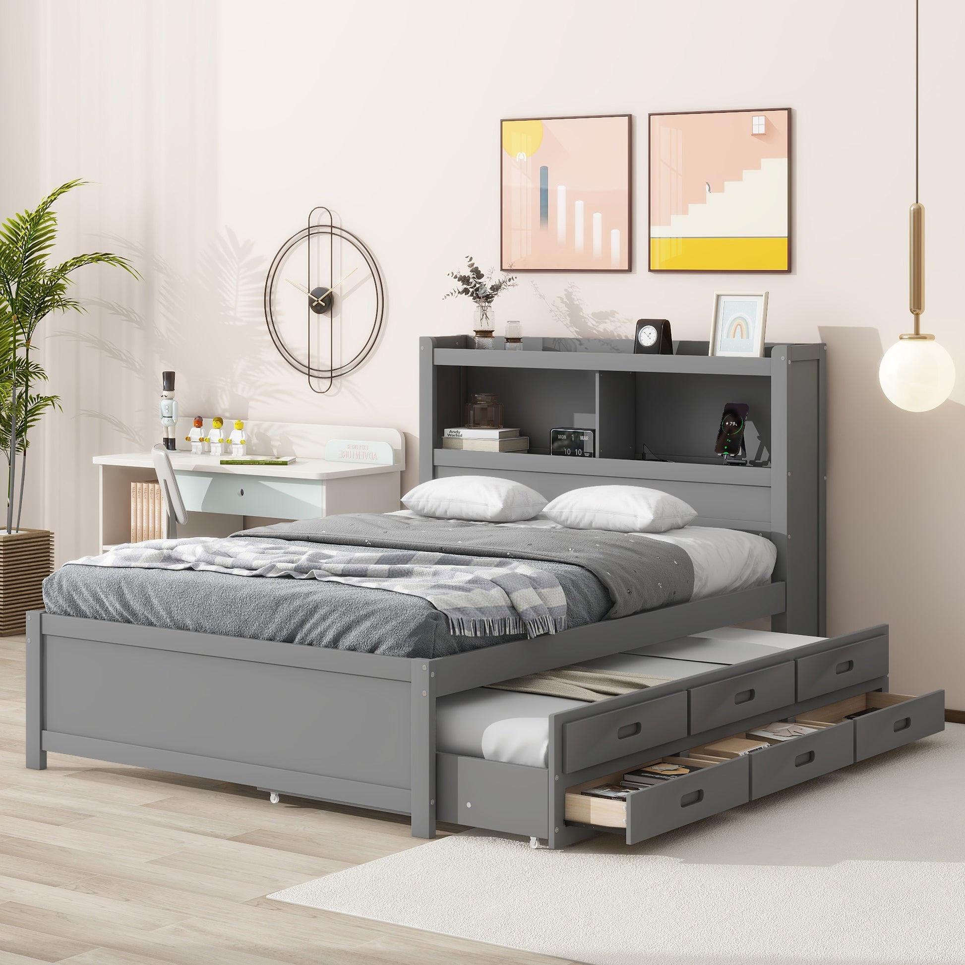 Gray twin bed with bookshelf headboard and pullout trundle bed