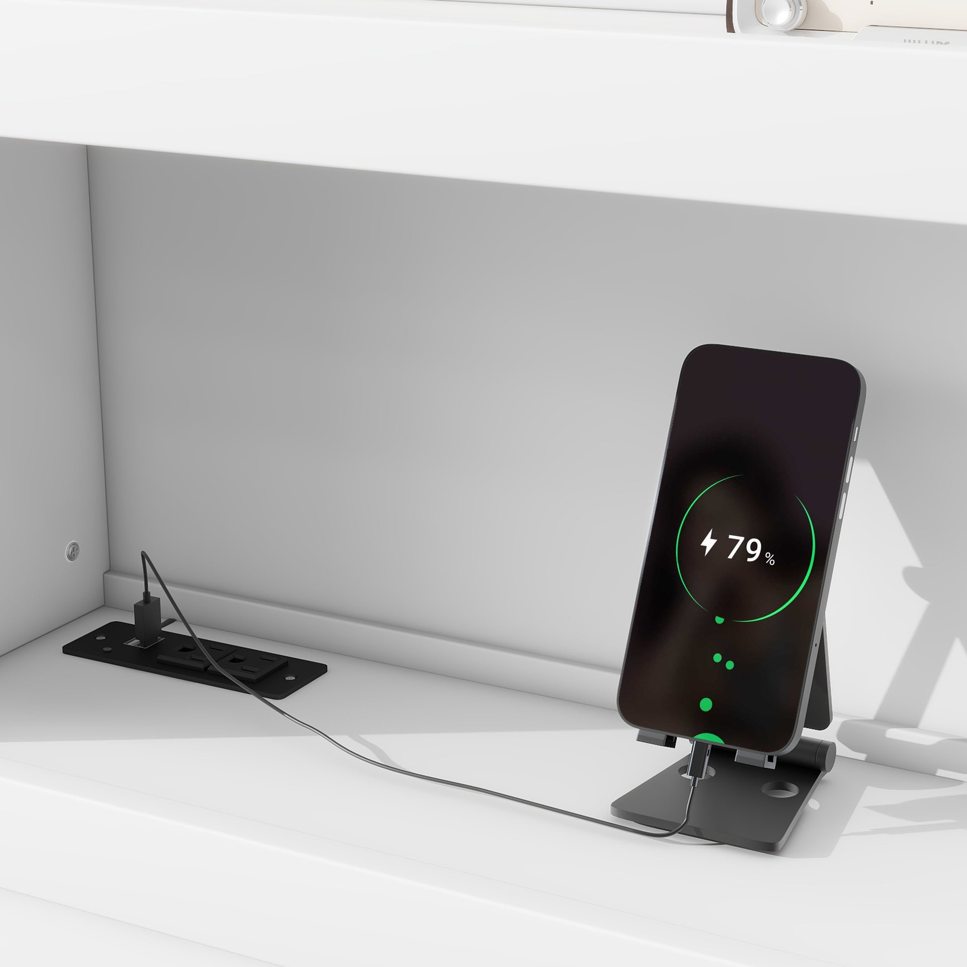 Black smartphone charging wirelessly on a foldable stand