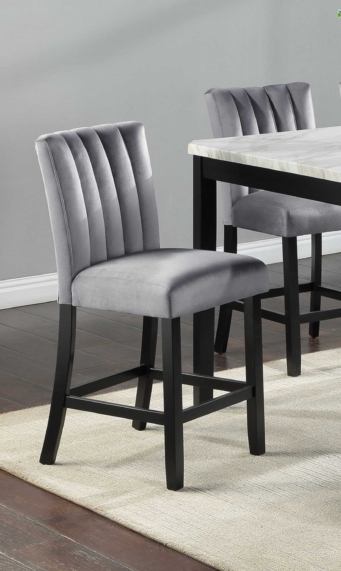 Grey velvet channel tufted bar stool with black wooden legs