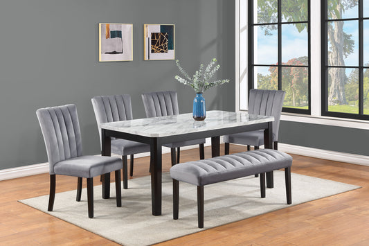 Gray velvet dining chairs with channel tufting and dark wood legs