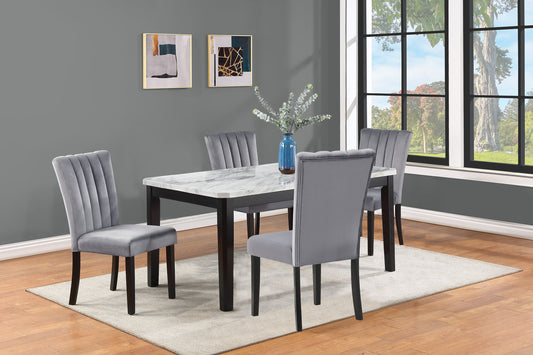 Gray velvet dining chairs with channel tufting and dark wood legs