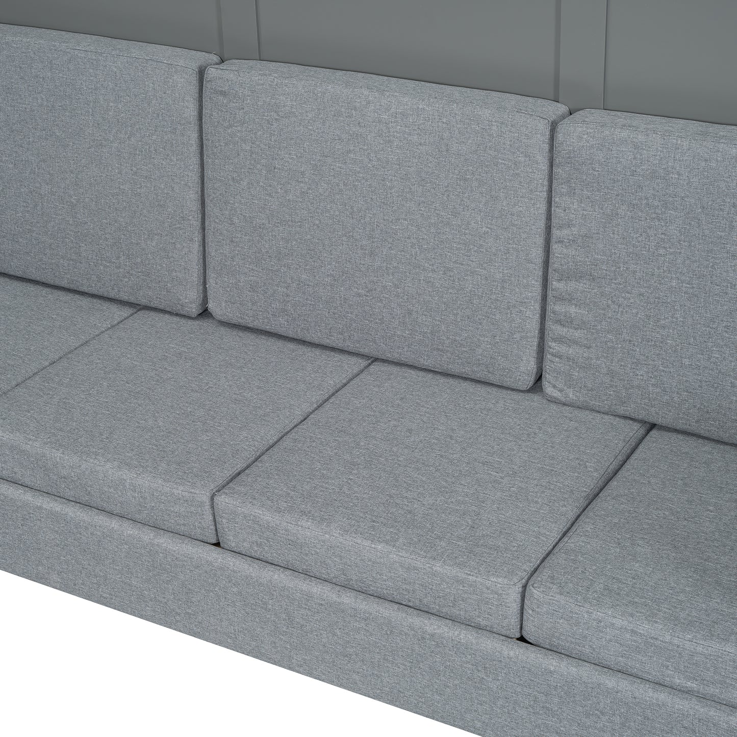 Closeup of grey fabric sofa cushions and seat