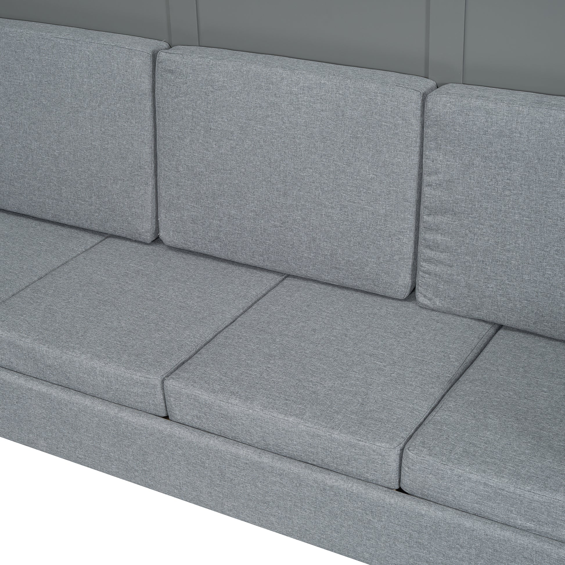 Closeup of grey fabric sofa cushions and seat