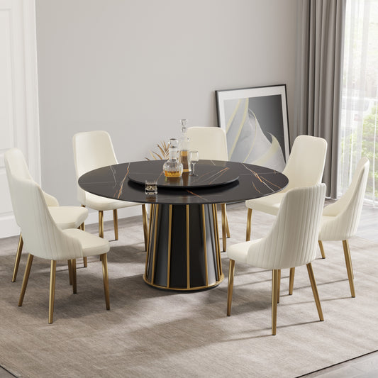 Black marble round dining table with gold pedestal base and cream chairs