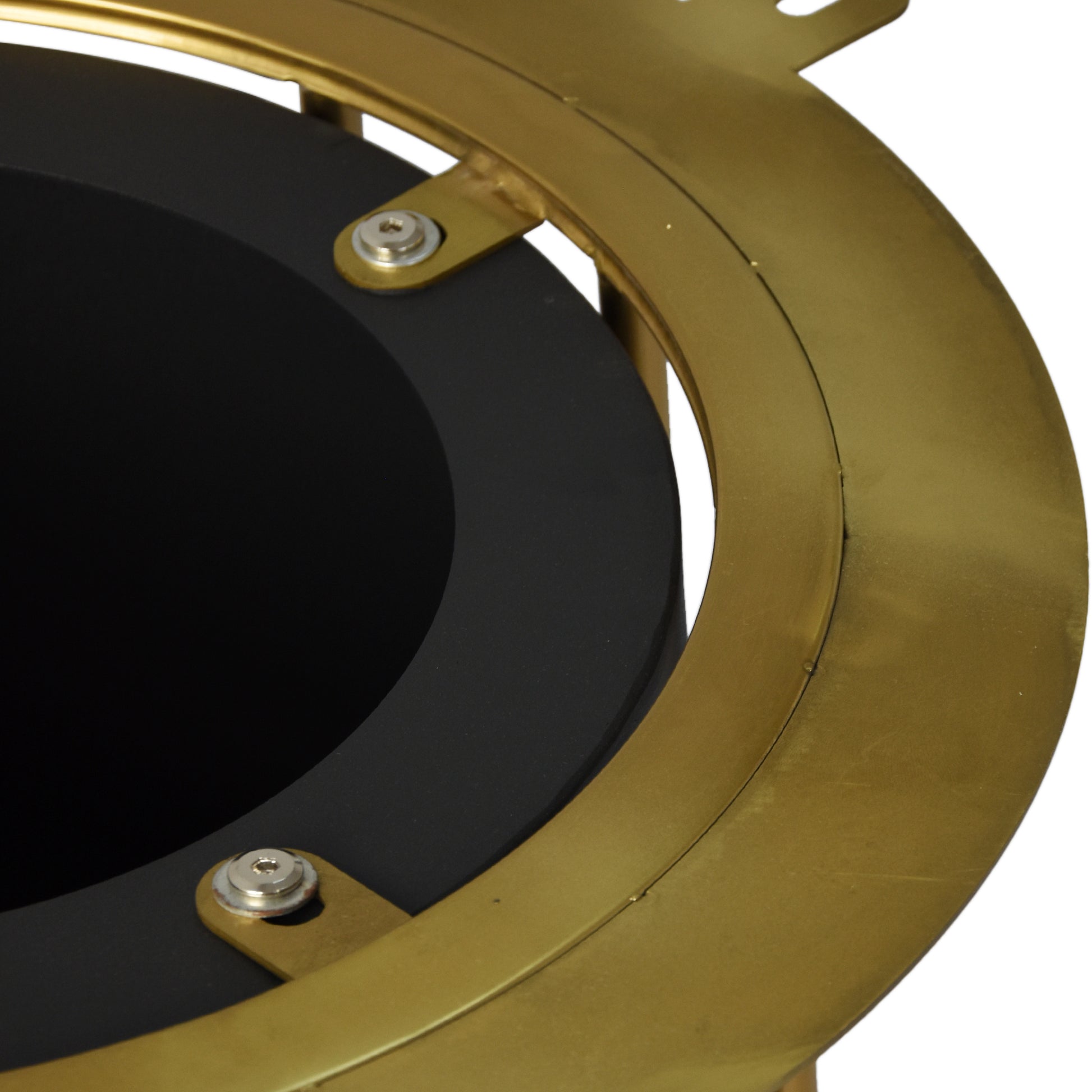 Closeup of a modern black planter with a brushed brass accent ring