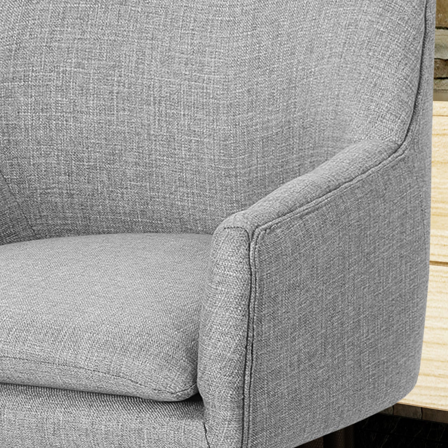 Gray textured fabric armchair detail