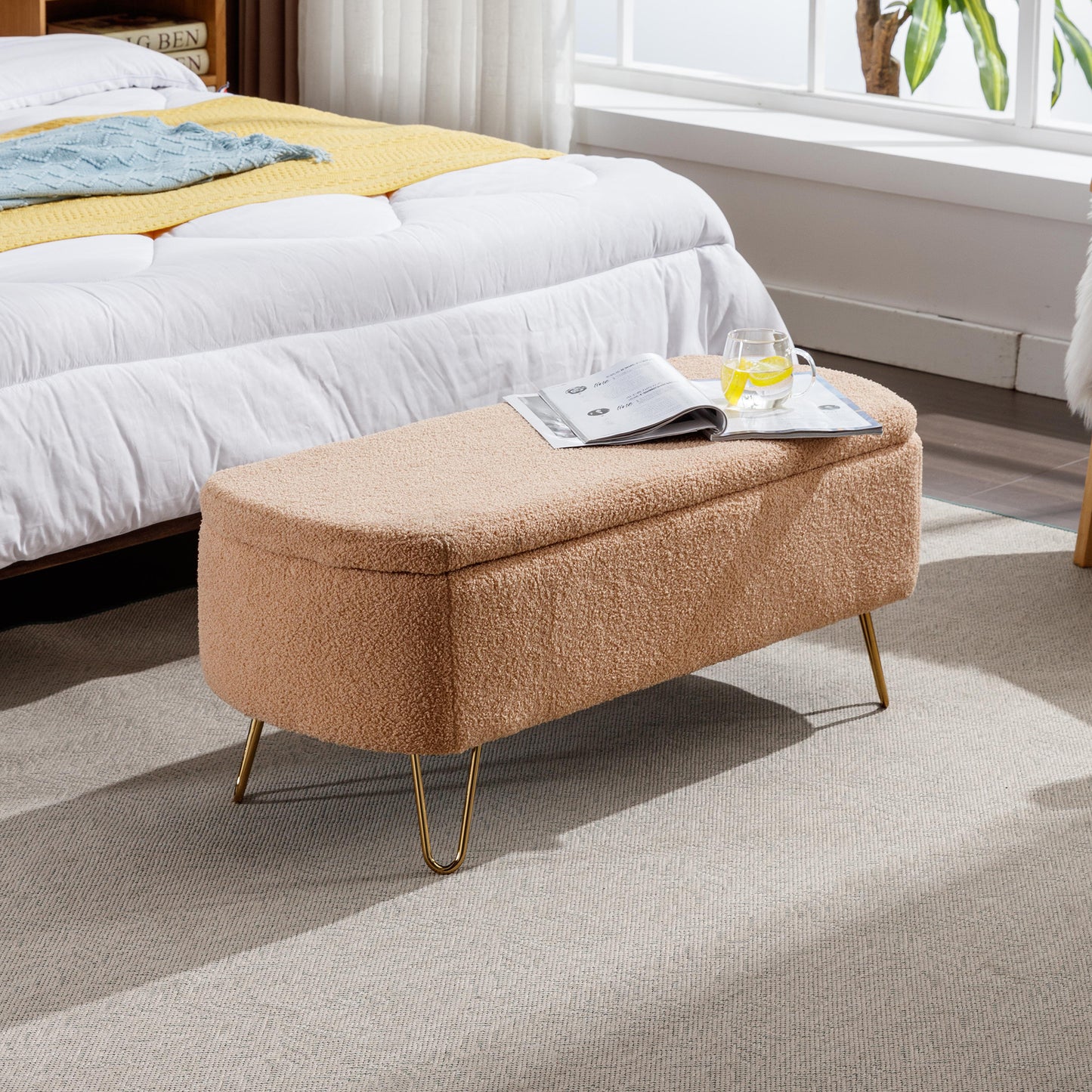 Beige teddy fabric storage ottoman with gold hairpin legs