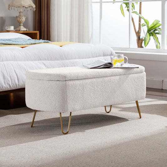 Cream boucle storage ottoman with gold hairpin legs