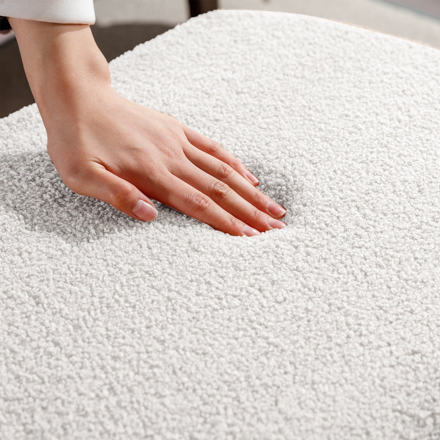 White boucle fabric cushion with plush texture