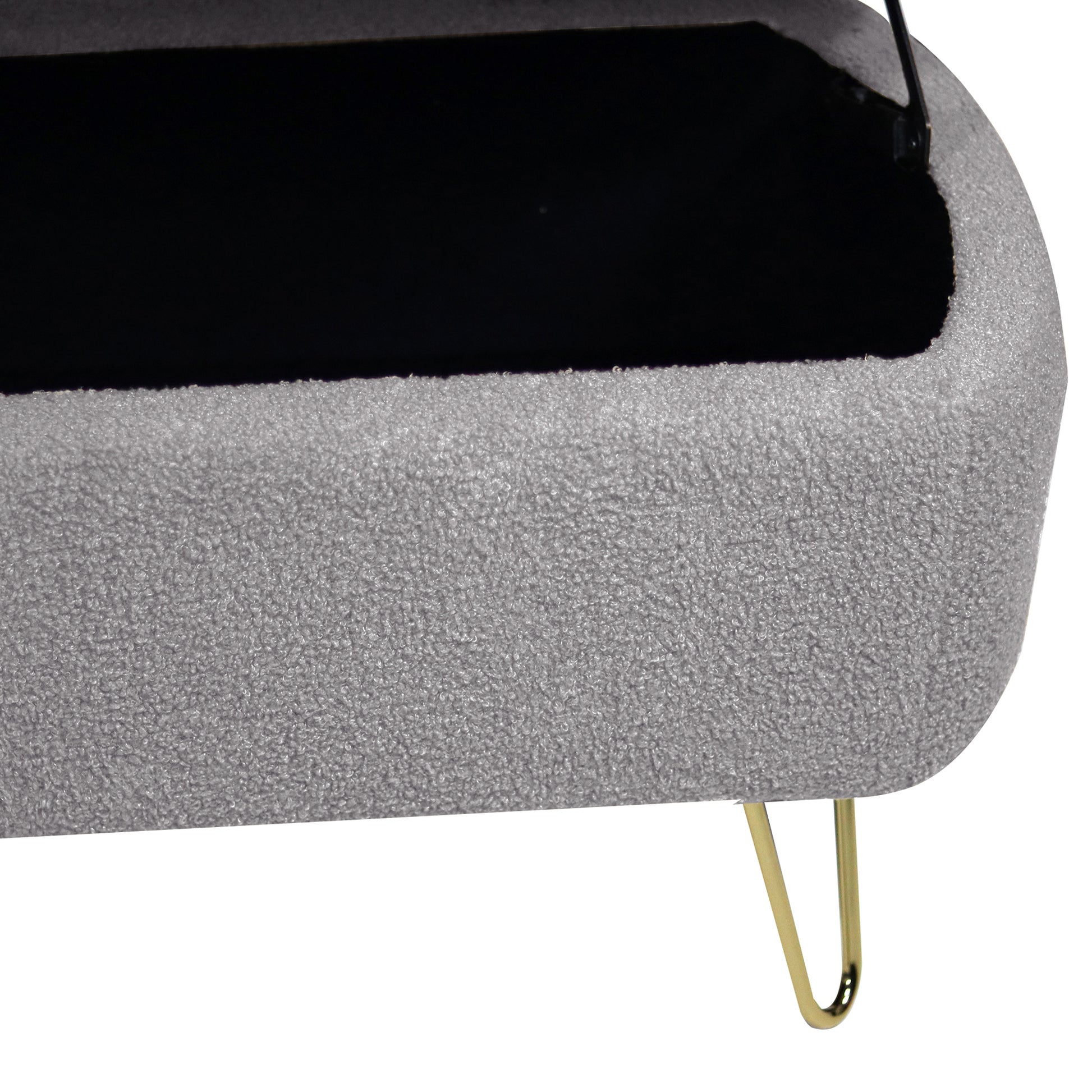 Gray boucle storage ottoman with gold hairpin legs