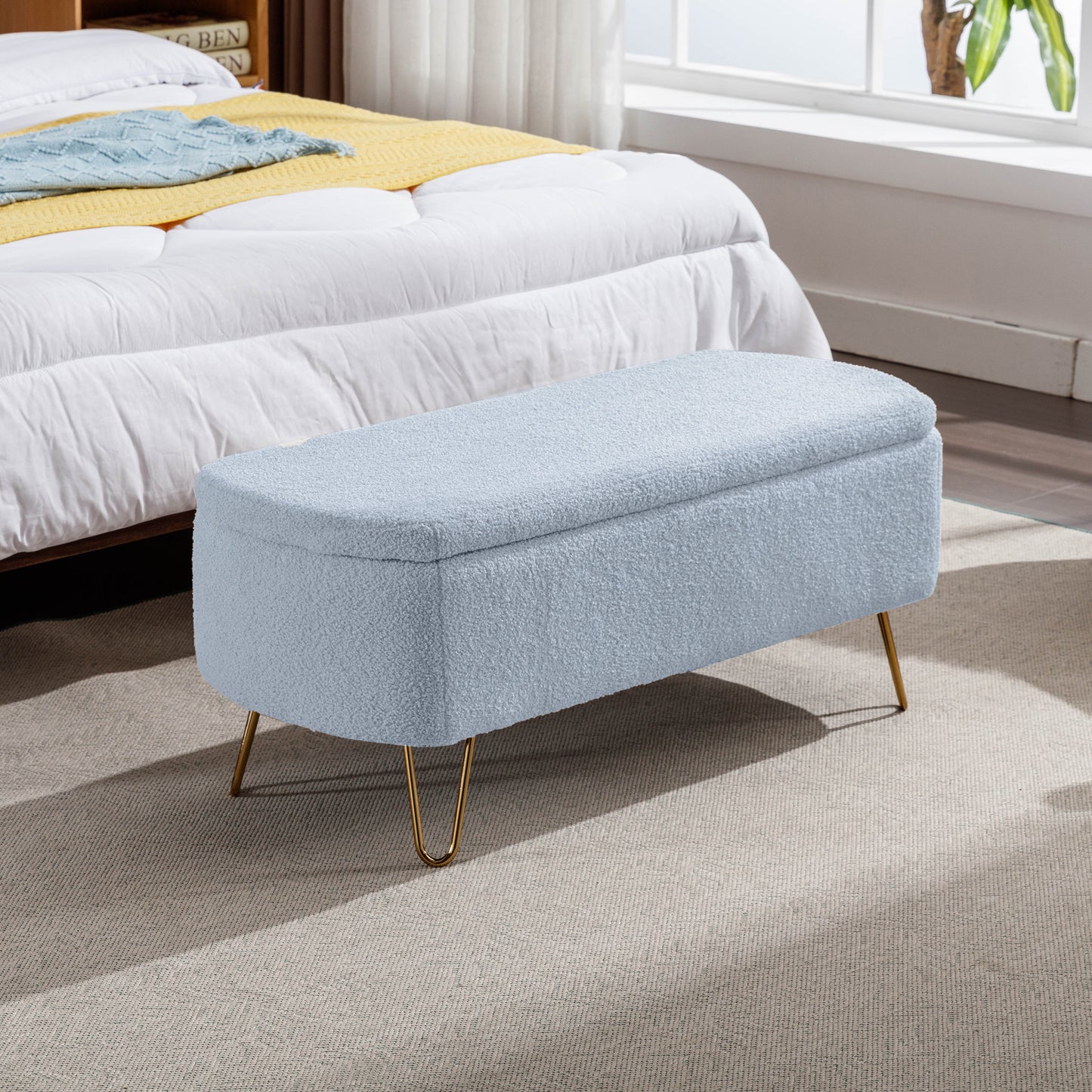 Light blue boucle storage bench with gold hairpin legs