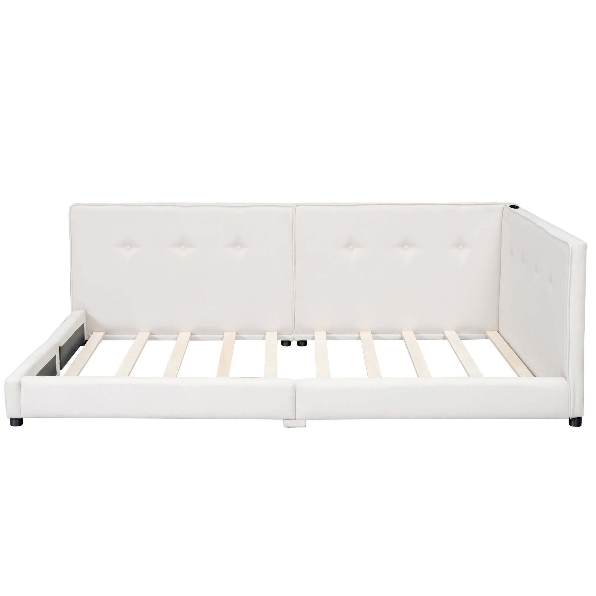 White faux leather daybed with tufted headboard and wooden slats