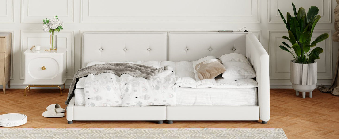 White upholstered twin daybed with tufted headboard and playful bedding