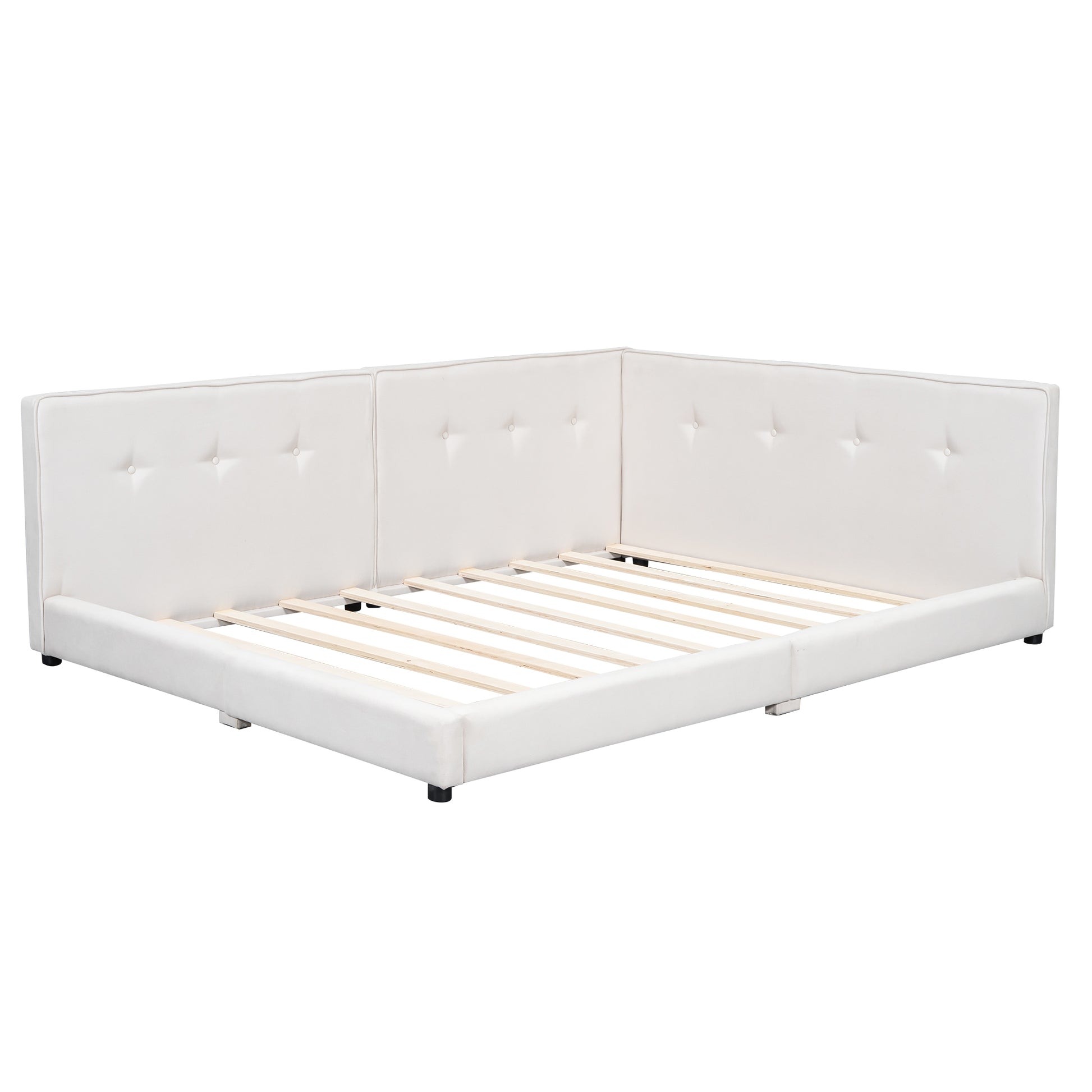 White upholstered tufted bed frame with slatted base