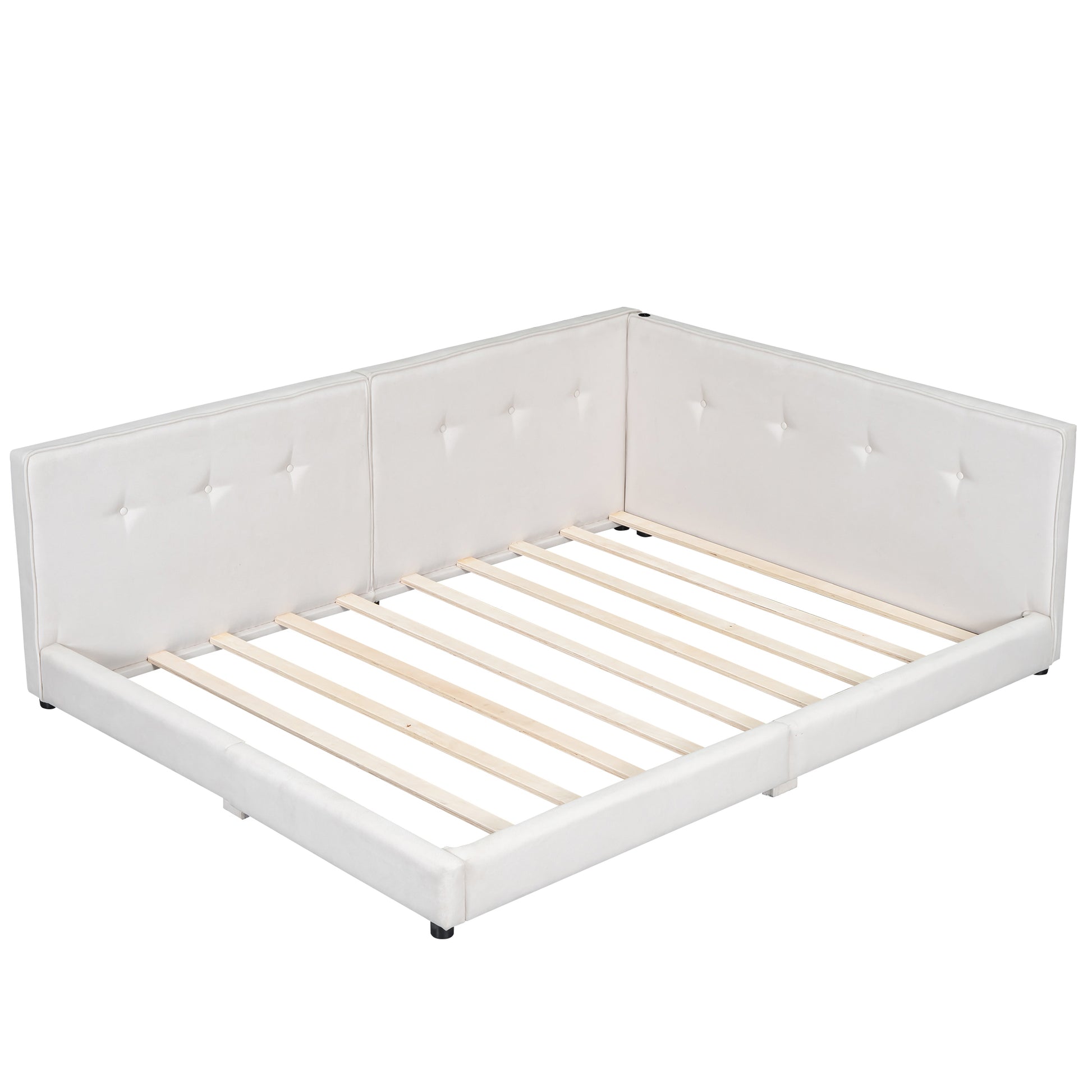 White upholstered tufted bed frame with wooden slats