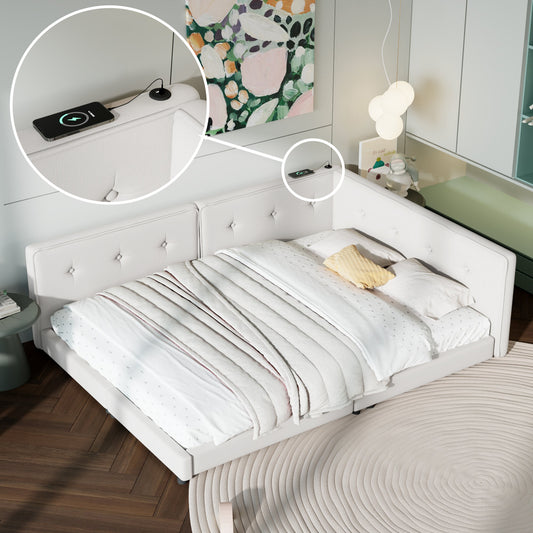 White upholstered bed with tufted headboard and builtin USB charging ports