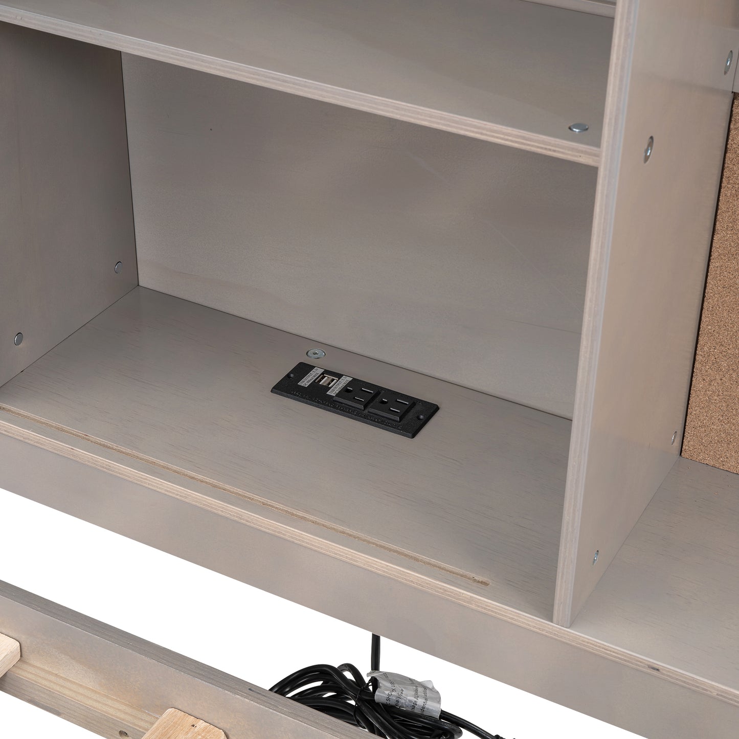 Builtin power outlet with USB ports on gray wood furniture