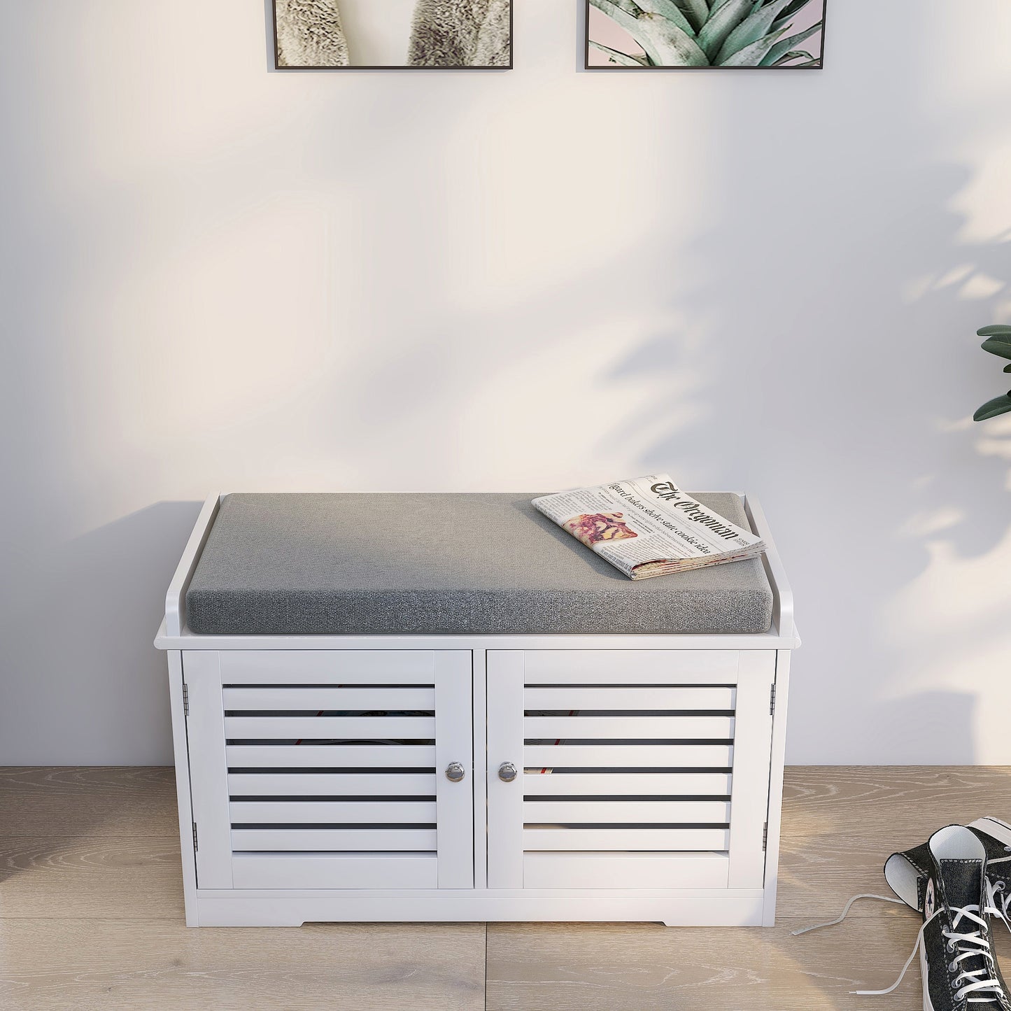 White entryway bench with gray cushion and louvered doors
