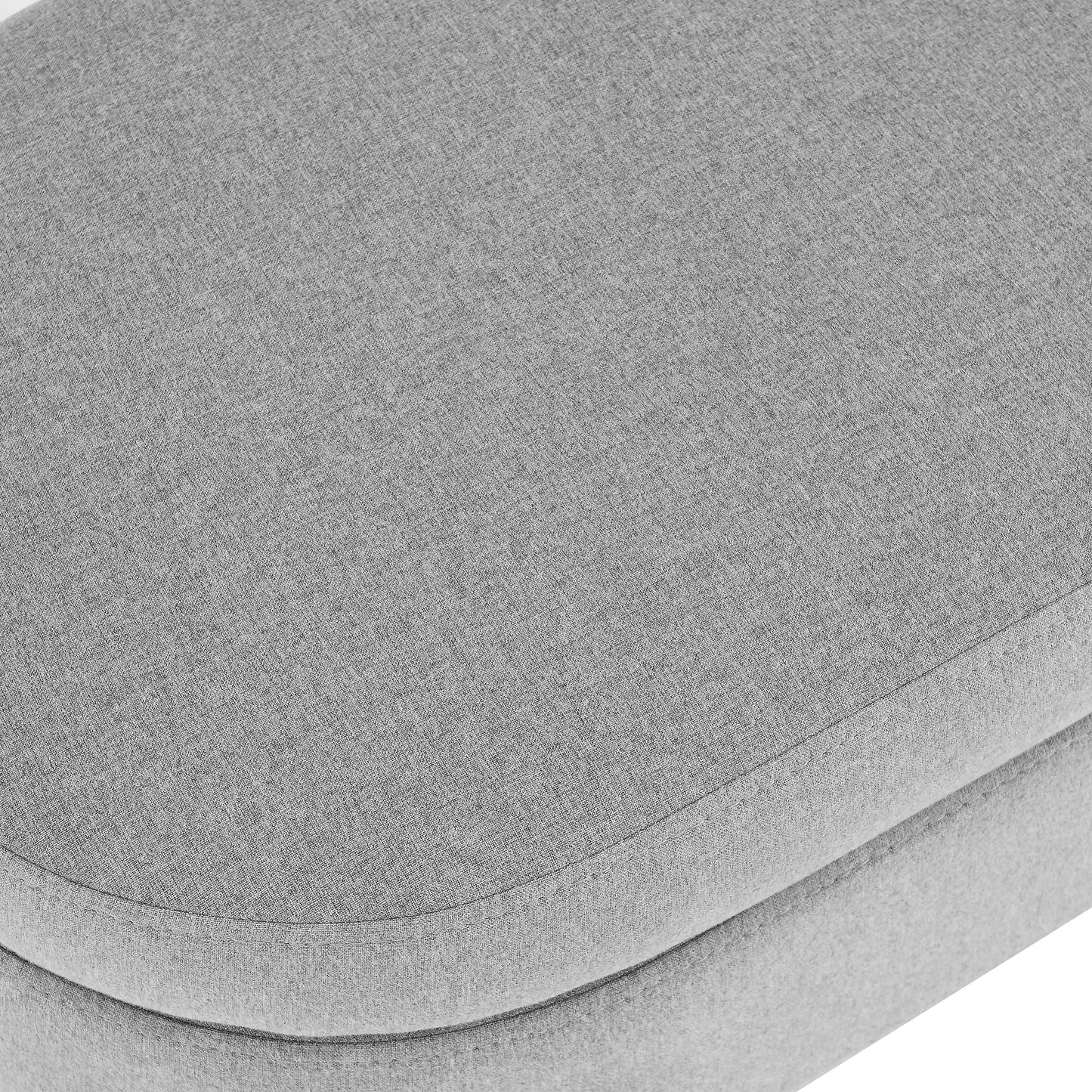 Closeup of grey textured fabric ottoman detail