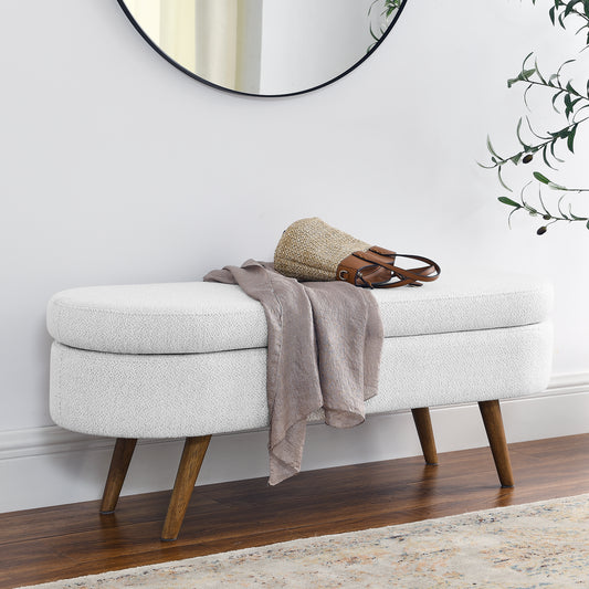 White boucle storage bench with midcentury modern wood legs