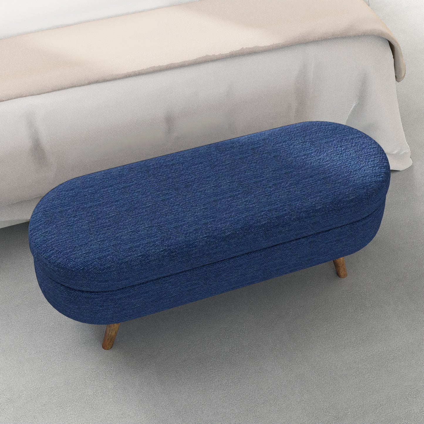 Oval blue denim storage ottoman with wood legs