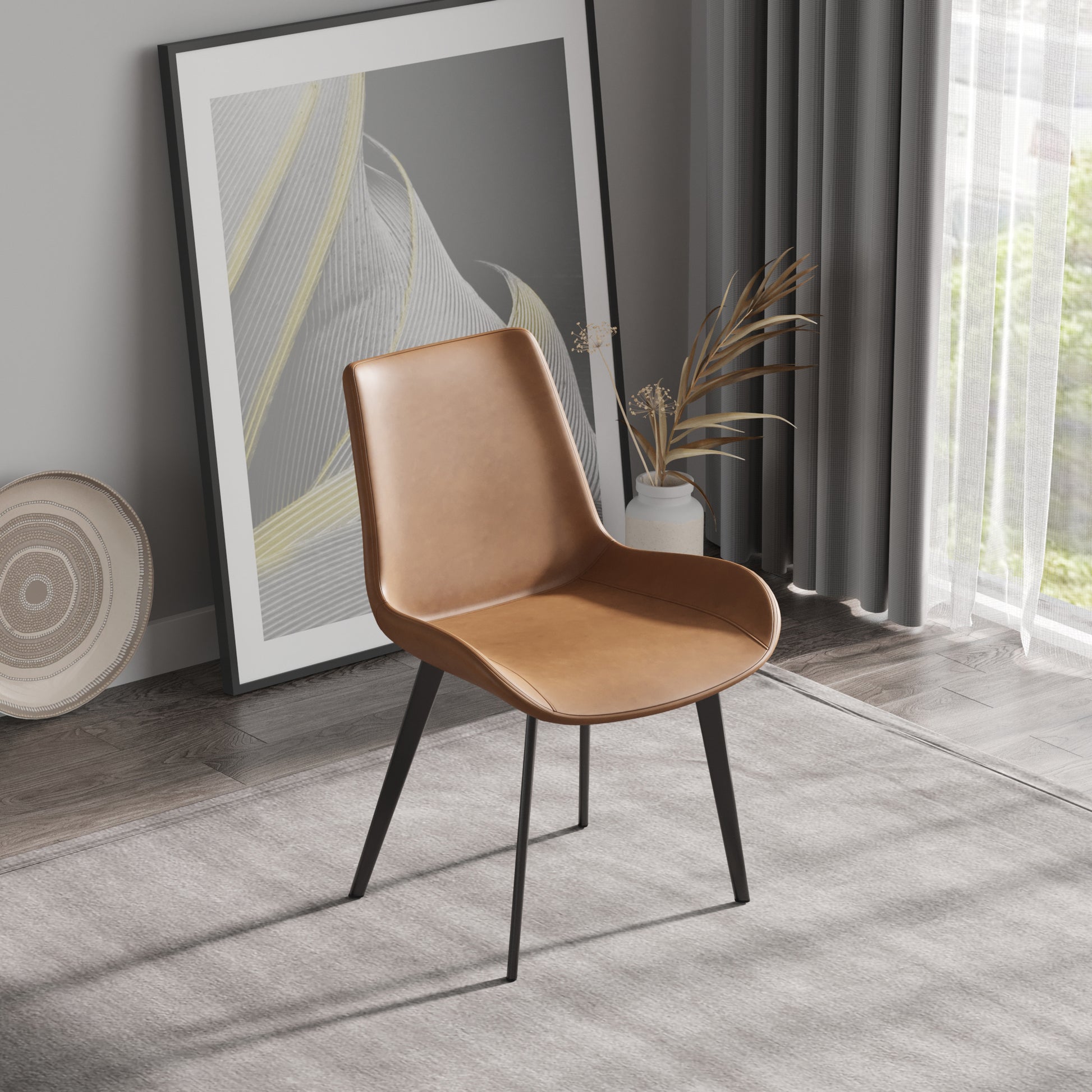 Tan faux leather dining chair with black metal legs