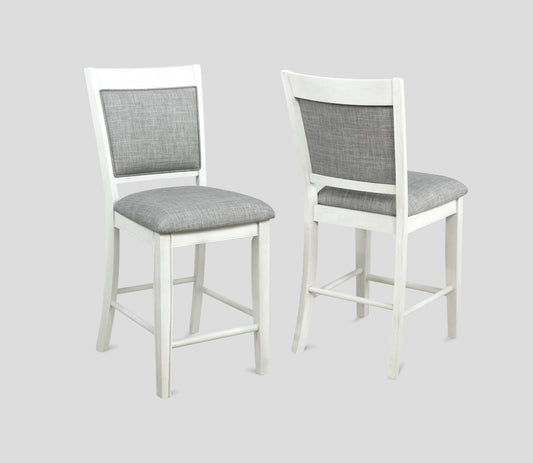 White wash counter stool with grey upholstered seat and back